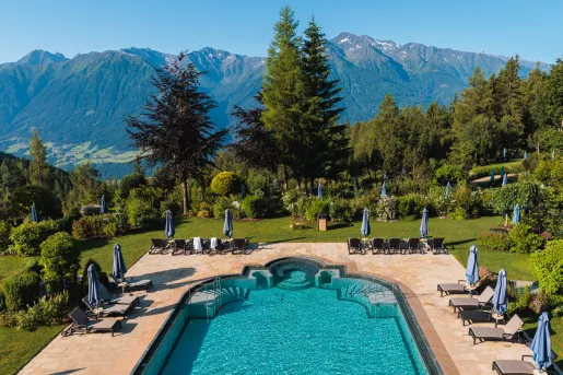 pool with lounge chairs