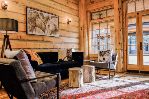 wood paneled living room with a horse painting