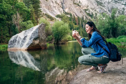 A hiker stops to take a photo