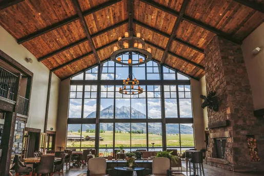 room with high vaulted ceilings and light fixtures