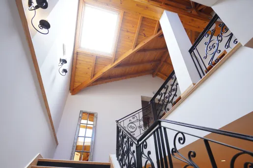 Staircase with a skylight above