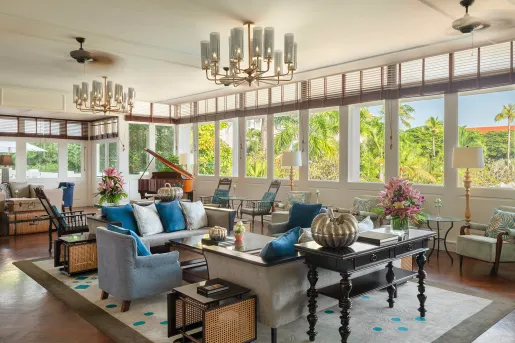 Hotel lobby and waiting room with cushioned sofas and large windows