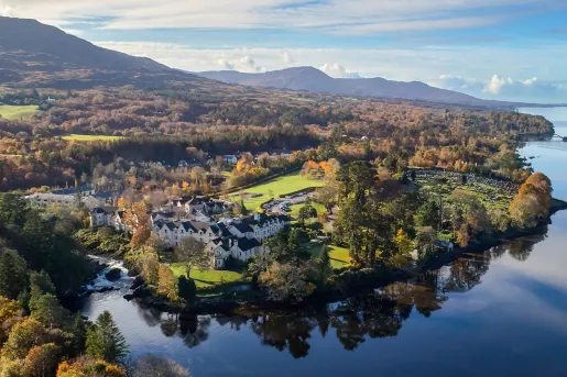Sky view of a town with a lake in the front
