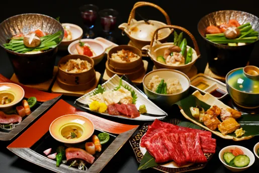 Small plates full of prepared, Japanese meals