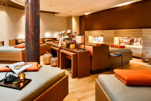 Hotel spa room with massage beds in a circular formation