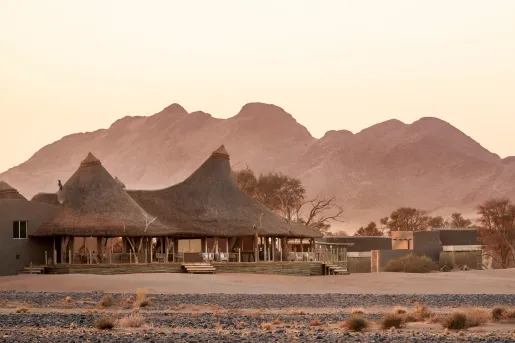 Large huts in the middle of a desert