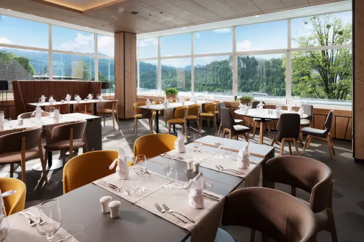 Dining table with large windows in the back