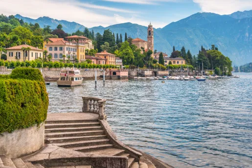 Ocean with a town and boats docked by the shore