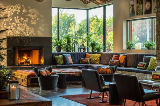 Corner room with large windows and cushioned seats