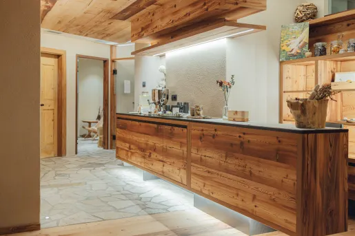 Spa entrance and counter, with wooden ceilings and walls