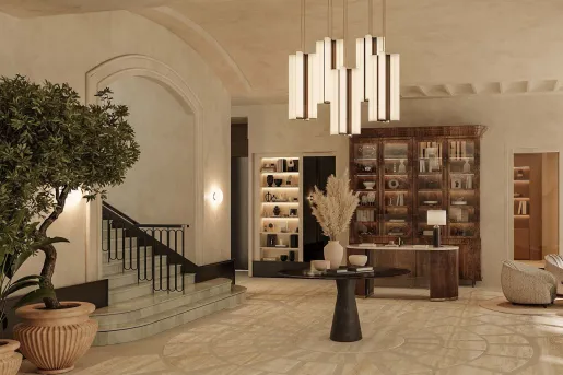 The lobby of the CORI Hornbæk Hotel in Denmark, that features a large modern chandelier. 