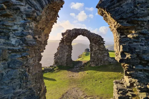Large stone arches in the middle of a valley