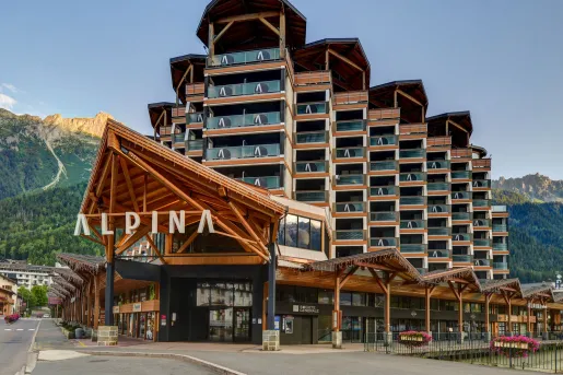 Exterior view of hotel building with rooms with large balconies