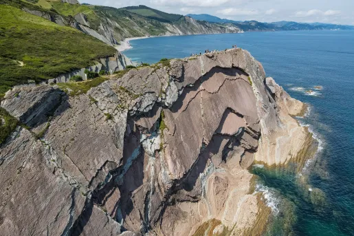 Large cliffs by the shore of an ocean