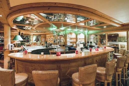 Bar and lounge with stools and a circular bar counter