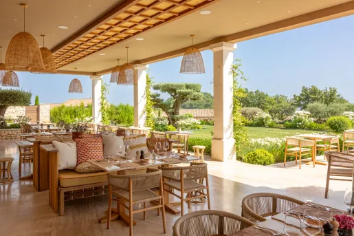 The outdoor terrace of the Casa Gia restaurant located at the La Bastide Saint Georges hotel in Forcalquier.