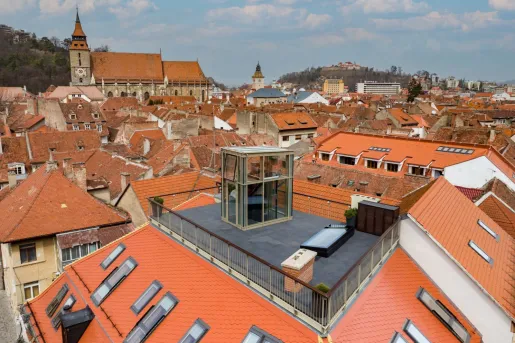 Rooftop view of orange buildings in a town center