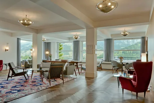 Hotel lobby with open layout and chairs with tables