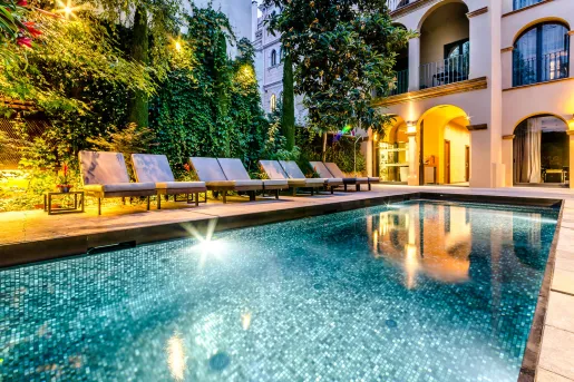 Outdoor pool illuminated in the evening