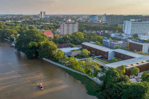 Sky view of city skyline, with a long river to the left