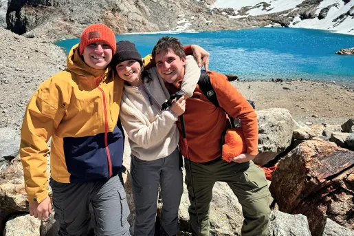 A happy, smiling family at Torres del Paine National Park, located in Chile's Patagonia region.   