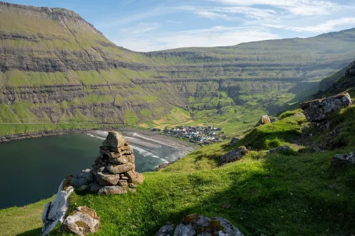Sky view of a large valley with tall hills and mountains