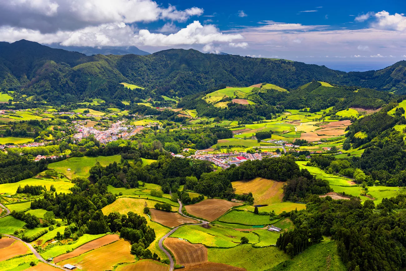 Aerial view of Lagoa das Furnas located on the Azorean island of Sao Miguel, Azores, Portugal. Lake Furnas (Lagoa das Furnas) on Sao Miguel, Azores, Portugal from the Pico do Ferro scenic viewpoint.