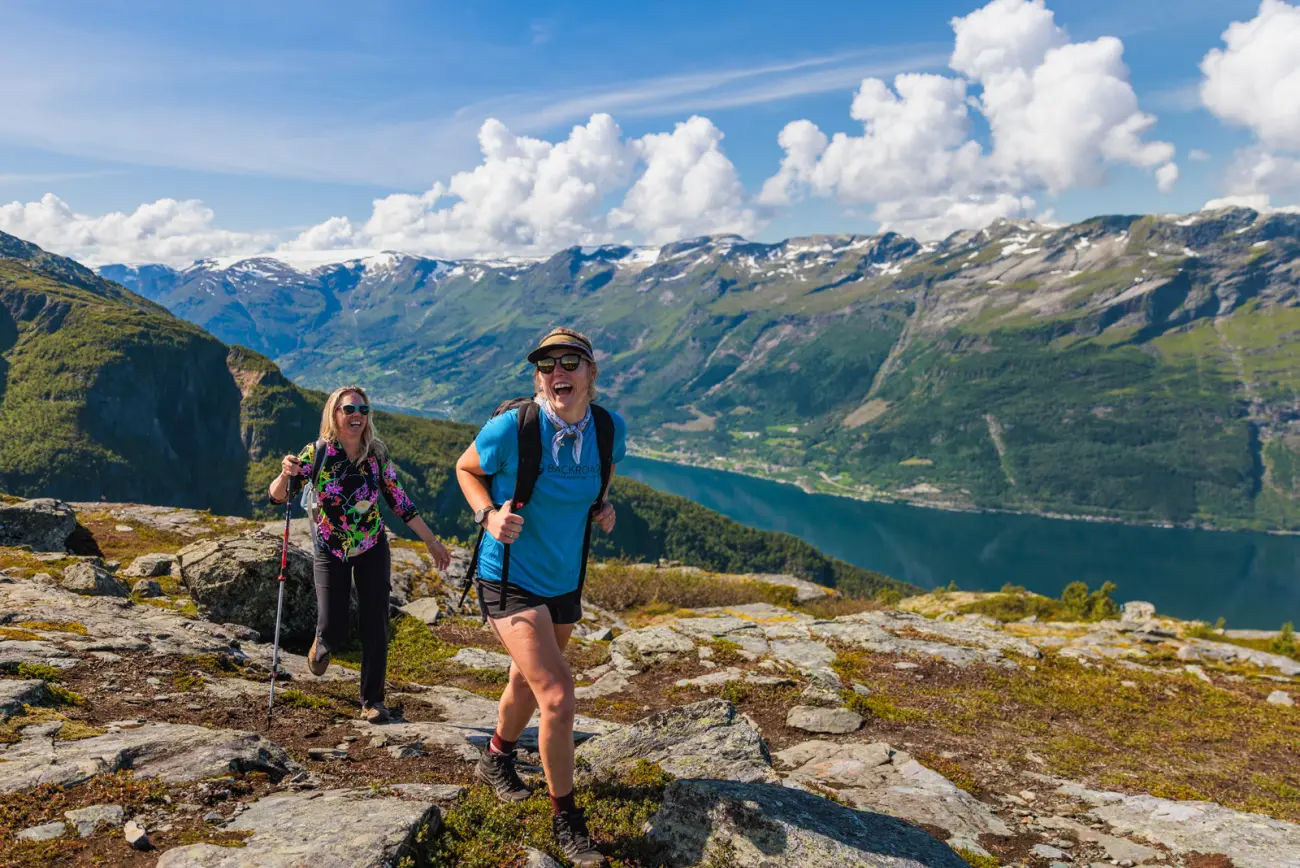 Two hikers at a summit