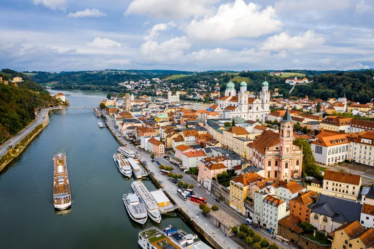 Aerial view of boats and cruise ships on the Danube River.