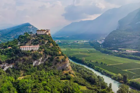 Village on a hill above a river in Italy