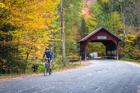Guest cycling out from bike bridge.