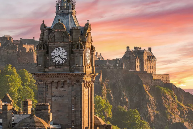clocktower against a pink sunset