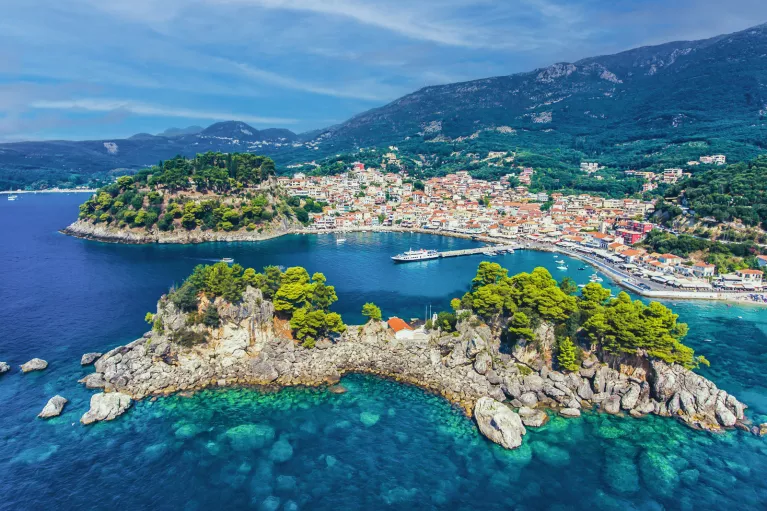 View of cottage lined islands in clear blue water