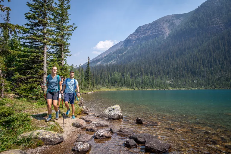 backroads guests hiking by a lake
