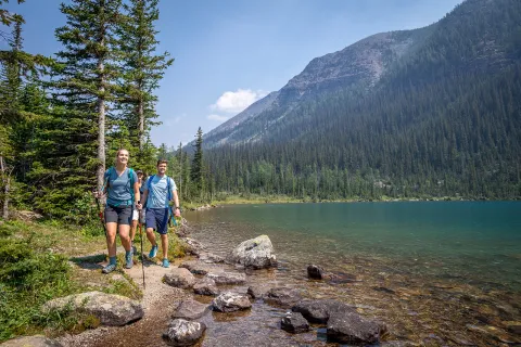 backroads guests hiking by a lake