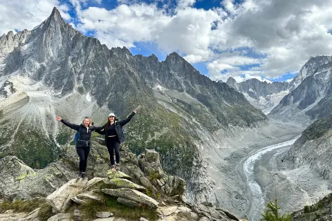 Two hikers on top a mountain