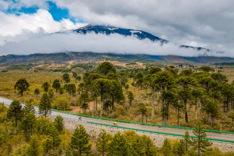 Large, open valley with an empty road in the center