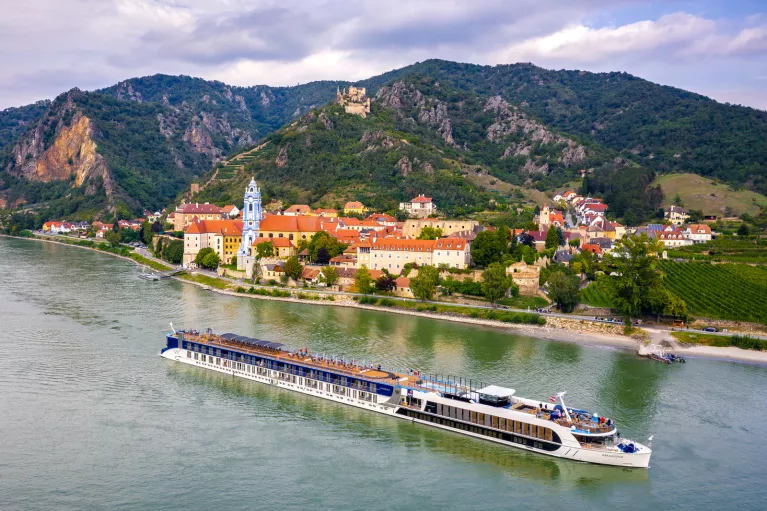 Large boat floating on a long river