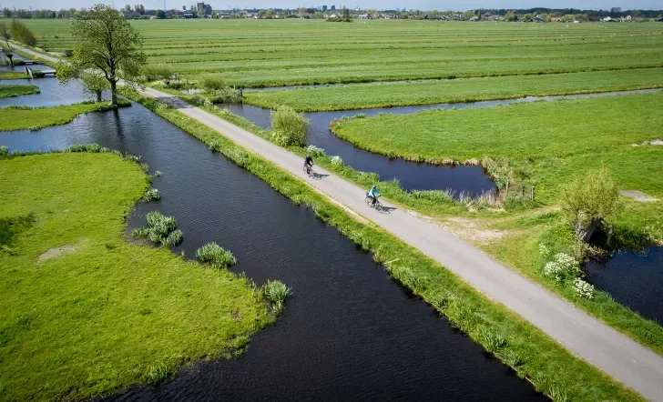 Ariel view of bikers in fields with ponds
