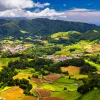 Aerial view of Lagoa das Furnas located on the Azorean island of Sao Miguel, Azores, Portugal. Lake Furnas (Lagoa das Furnas) on Sao Miguel, Azores, Portugal from the Pico do Ferro scenic viewpoint.