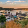 Wide shot of ferry port at sundown.