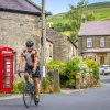 Cyclist Red Telephone Booth Scotland