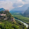 Village on a hill above a river in Italy