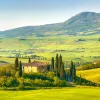 Wide shot of Tuscan countryside.