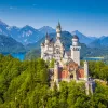 Beautiful view of world-famous Neuschwanstein Castle, the 19th century Romanesque Revival palace built for King Ludwig II, with scenic mountain landscape near Fussen, southwest Bavaria, Germany