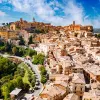 Rustic town full of brick buildings and trees