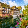 European-style houses in a row by a river canal