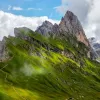 Steep mountain peaks covered in grass