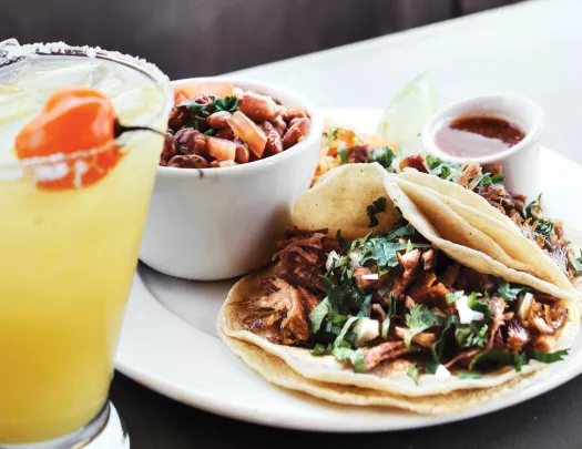 Plate of mushroom tacos and a margarita.