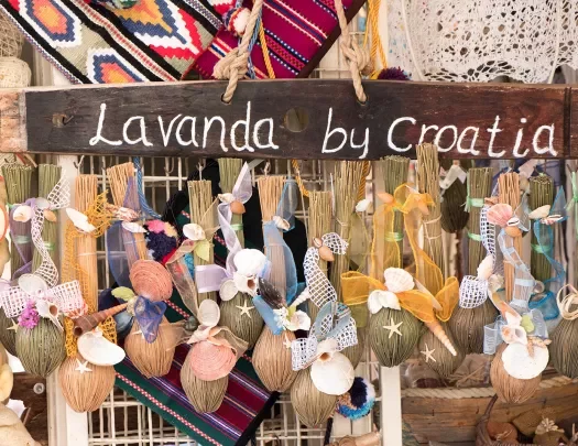Close-up of Croatian storefront, "Lavanda". Hanging seashells.